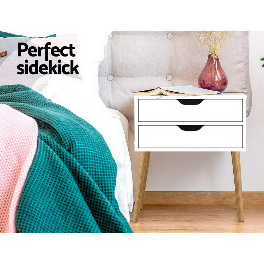 Bodie Bedside Table featuring Scandinavian design with two drawers and splayed legs, finished in white particle board.