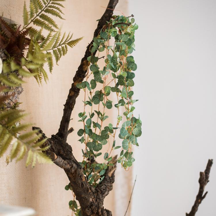 A 27-inch long Begonia Leaf Hanging Vine featuring realistic green leaves made from plastic and silk cloth, perfect for indoor and outdoor decor.