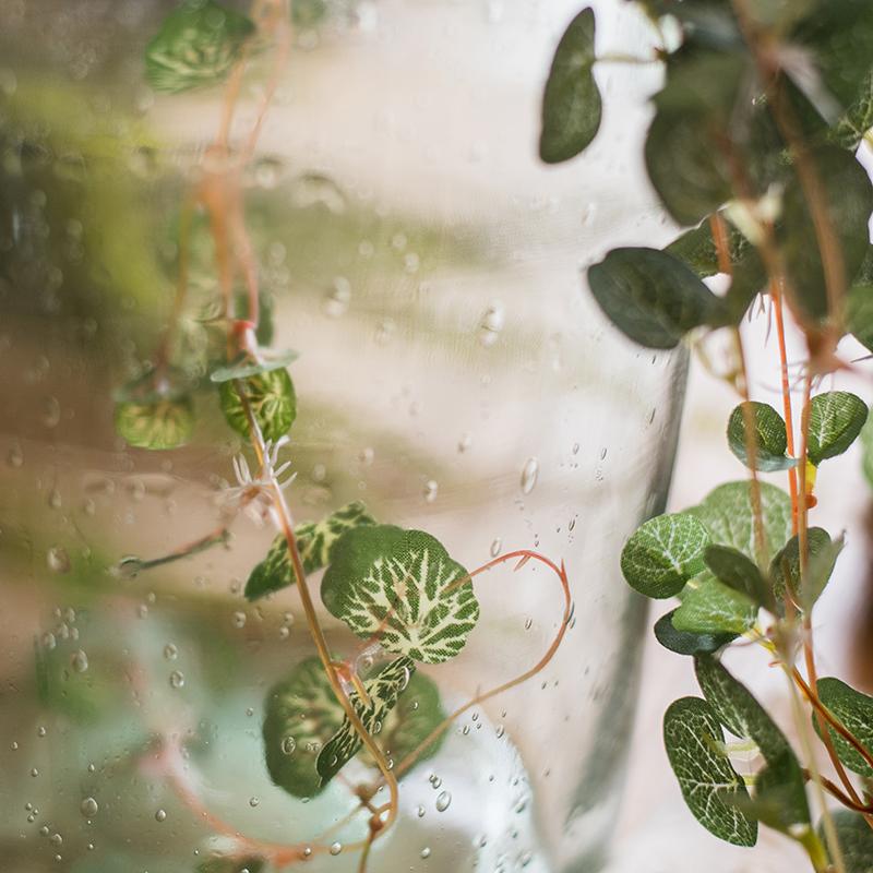 A 27-inch long Begonia Leaf Hanging Vine featuring realistic green leaves made from plastic and silk cloth, perfect for indoor and outdoor decor.