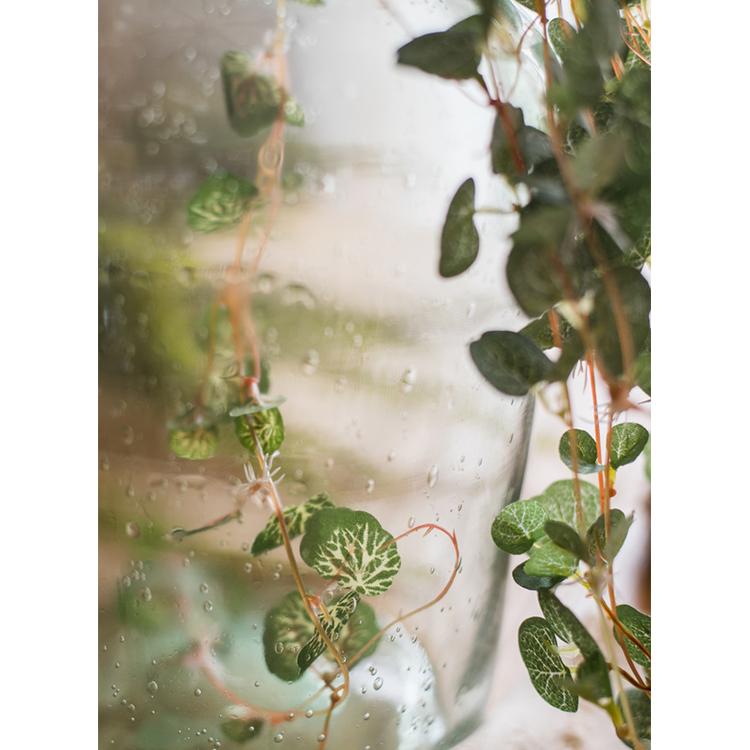 A 27-inch long Begonia Leaf Hanging Vine featuring realistic green leaves made from plastic and silk cloth, perfect for indoor and outdoor decor.