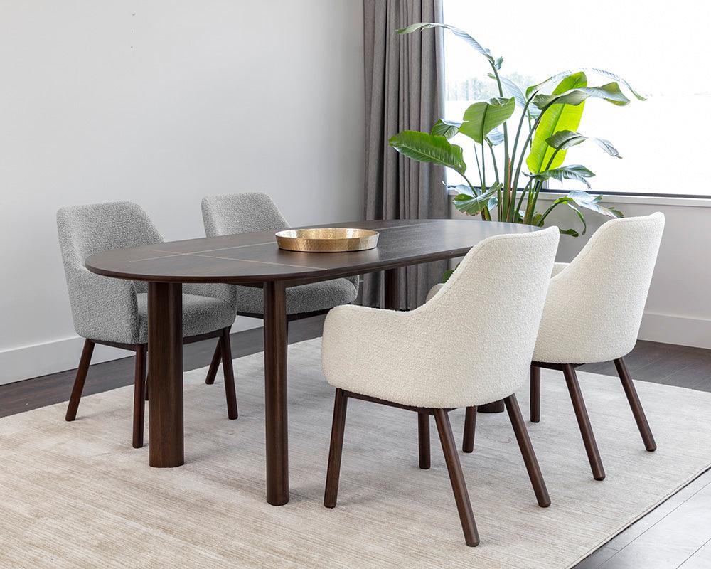 Belen Dining Armchair in Altro Cappuccino featuring boucle fabric seat and dark walnut beech timber legs.