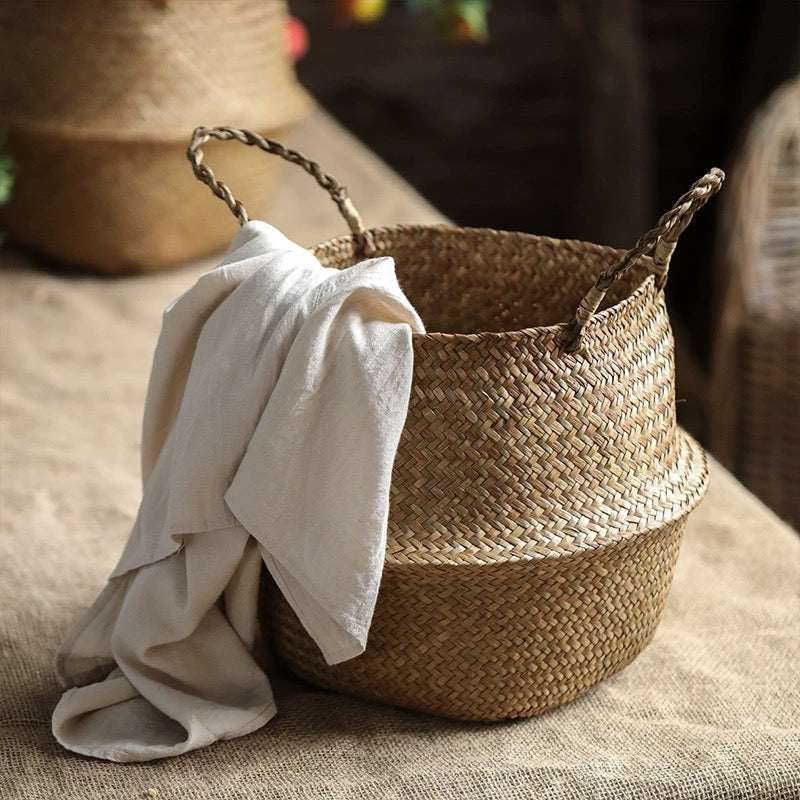 Belly Basket Seagrass Basket with twin handles in natural color, showcasing its stylish design and eco-friendly material.