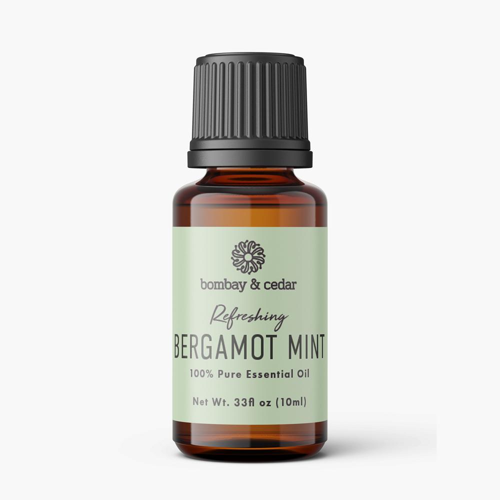 10ml bottle of Bergamot Mint Essential Oil with a green label, showcasing its refreshing and therapeutic properties.