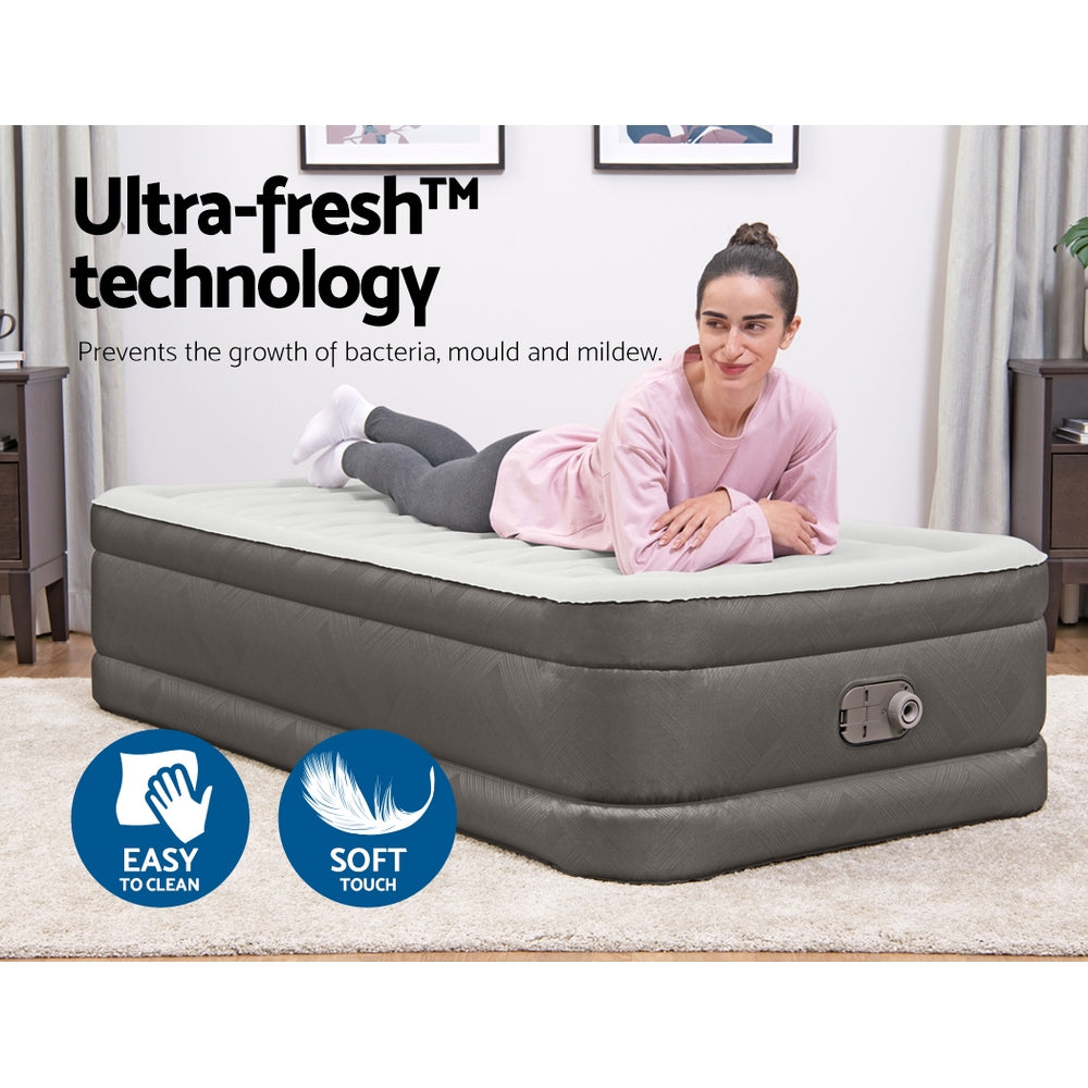 Bestway Air Mattress Bed Single Size with a flocked surface, showcasing its sturdy construction and built-in pump.