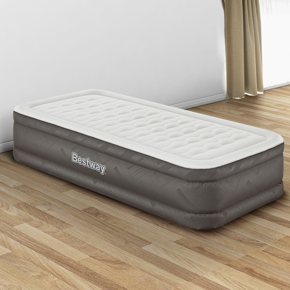 Bestway Air Mattress Bed Single Size with a flocked surface, showcasing its sturdy construction and built-in pump.