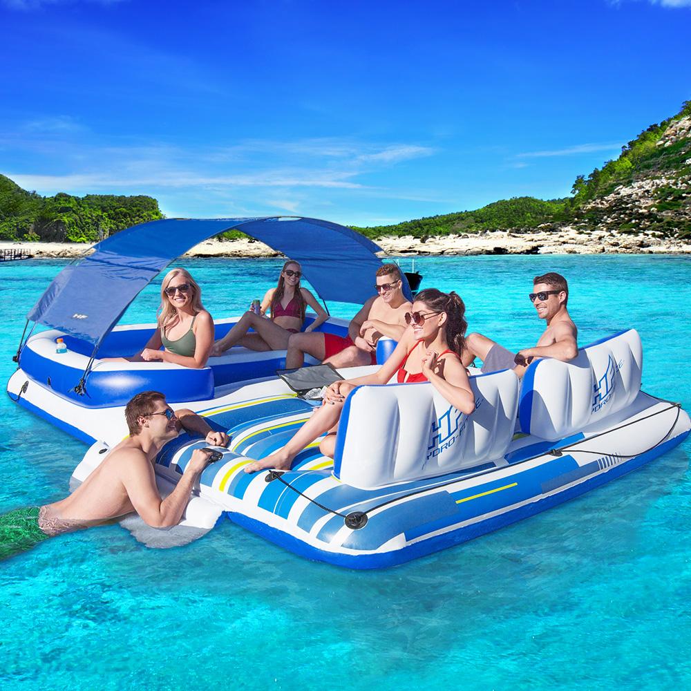 Bestway Inflatable Floating Island Lounge with six cup holders and sun shade, perfect for summer fun on the water.