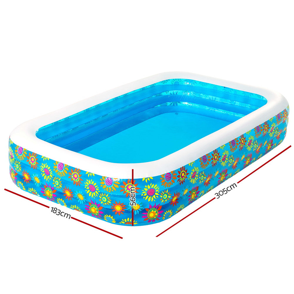 Bestway Inflatable Rectangular Family Pool set up in a backyard, showcasing its spacious design and child-safe border.