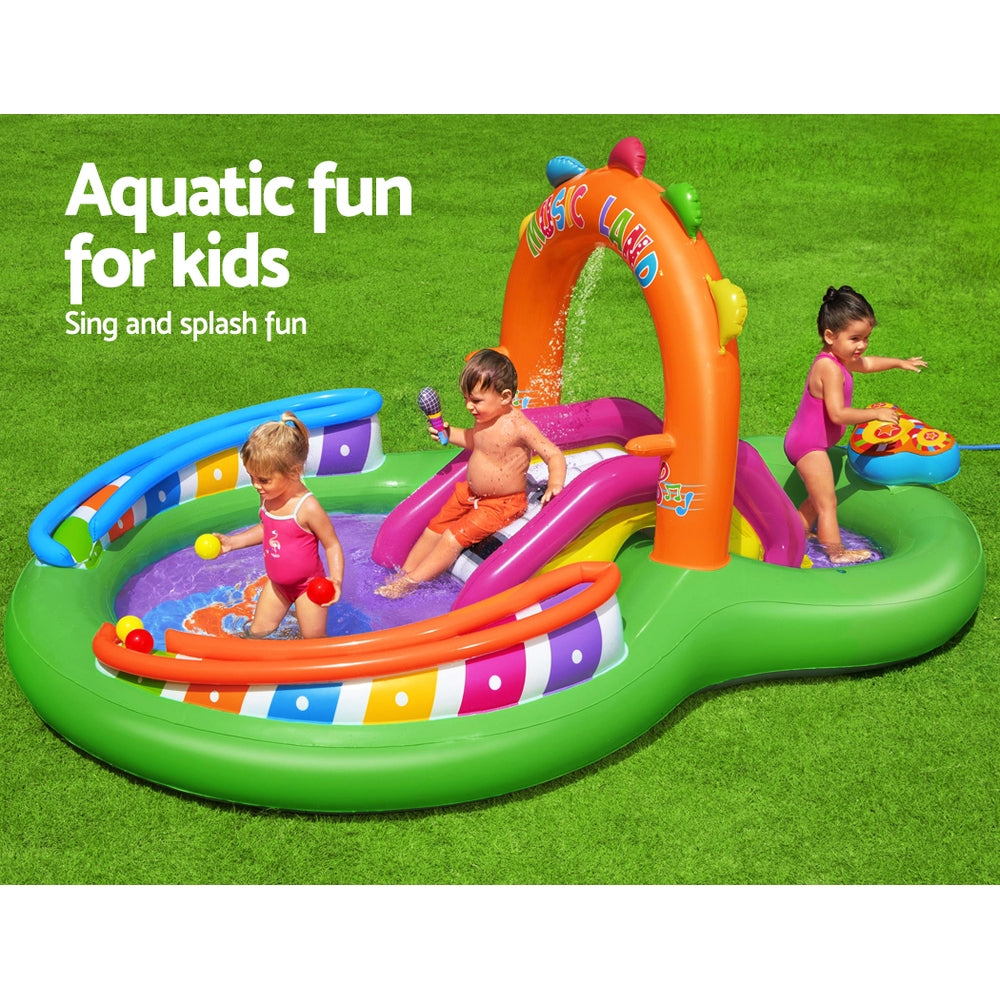 Bestway Inflatable Sing N Splash play pool featuring musical instruments, slide, and water sprayer for kids.