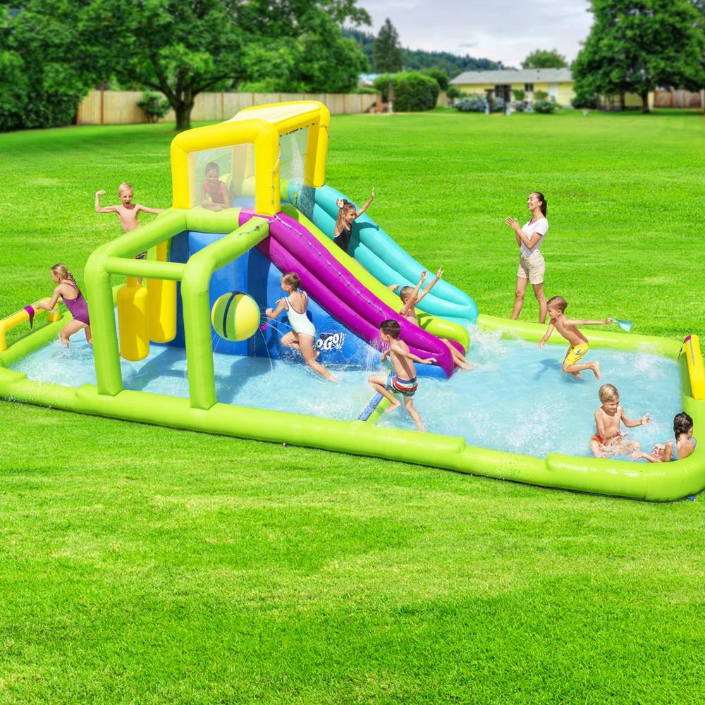 Bestway H2OGO Inflatable Water Park featuring a giant slide, colorful design, and safety mesh walls, perfect for outdoor summer fun.