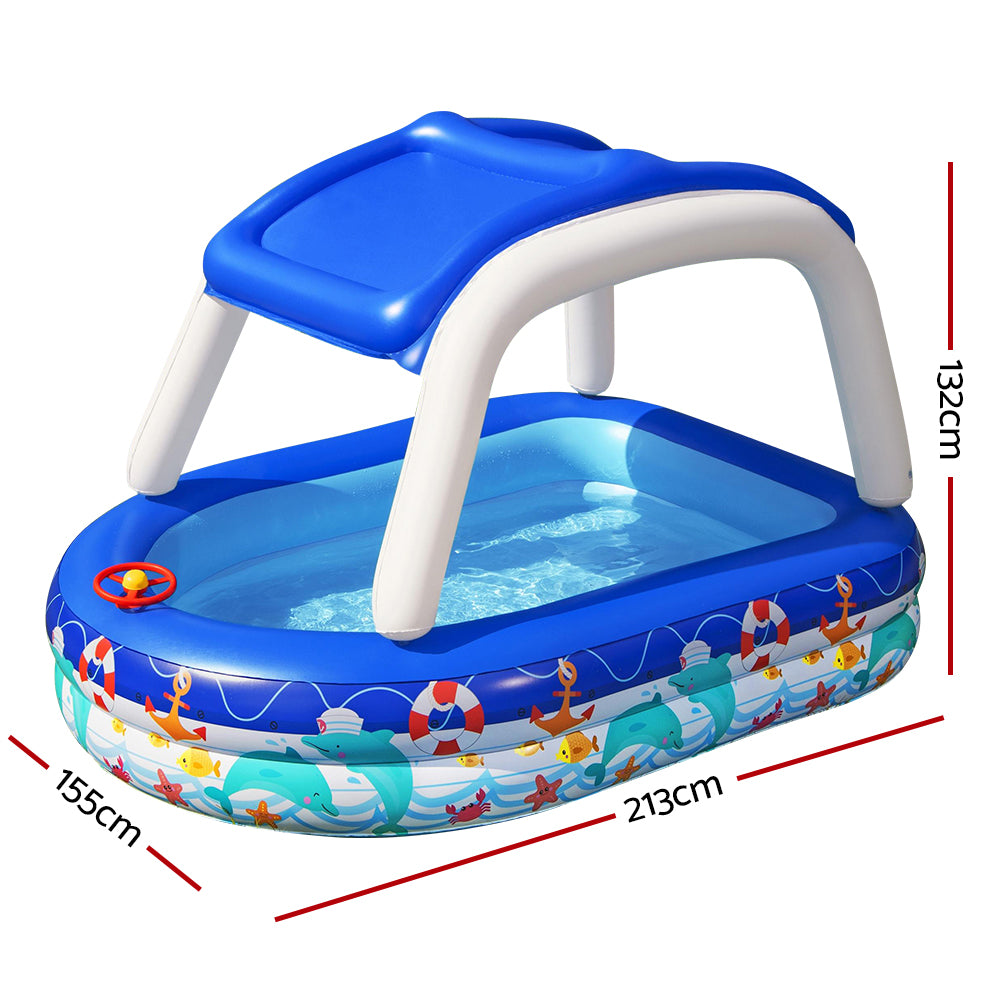 Bestway Sea Captain Family Pool with removable canopy, featuring a built-in steering wheel and vibrant colors for imaginative play.