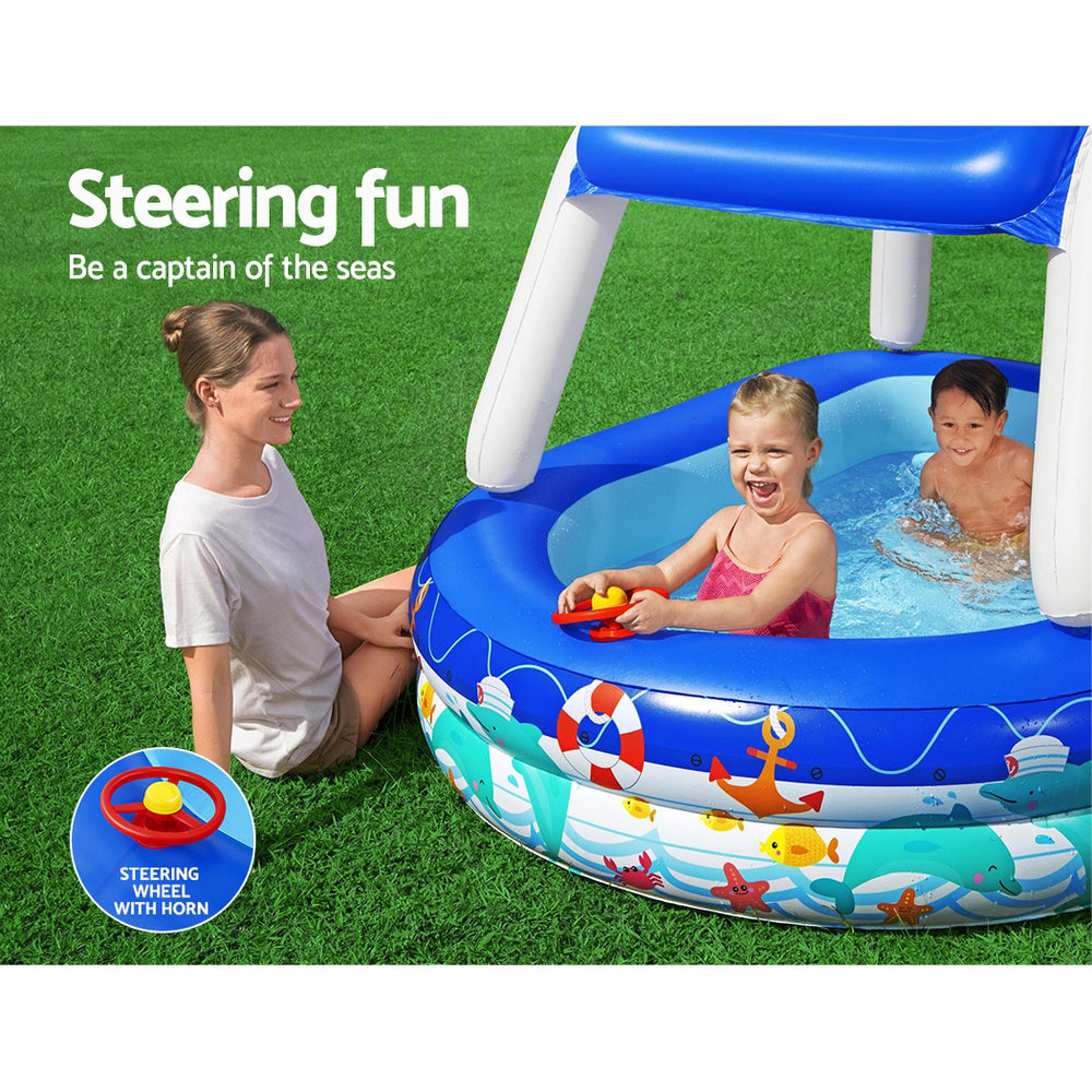 Bestway Sea Captain Family Pool with removable canopy, featuring a built-in steering wheel and vibrant colors for imaginative play.