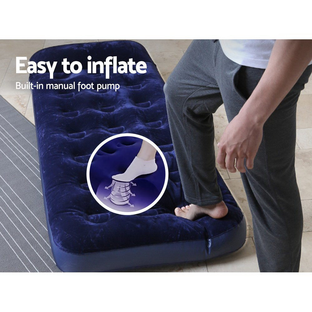 Bestway Single Size Inflatable Air Mattress in navy color with a comfortable flocked surface and built-in pillow.