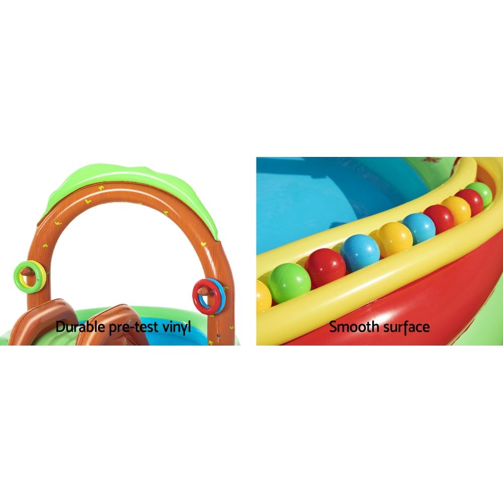 Bestway Swimming Pool Above Ground Inflatable for kids featuring a slide, water sprayer, and colorful play accessories in a backyard setting.