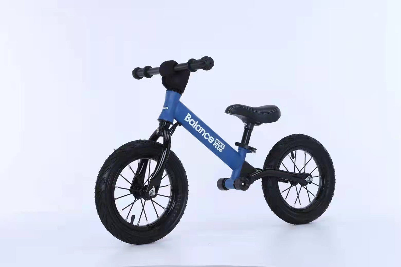 Bike Plus Kids Balance Bike in blue with suspension, featuring 12-inch spoked wheels and adjustable seat for children aged 2-6.