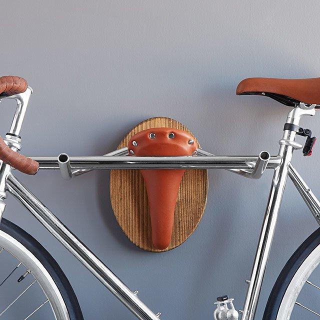 Hand-crafted Bicycle Taxidermy wall rack resembling a Texas longhorn, made from Evergreen Wood and leather.