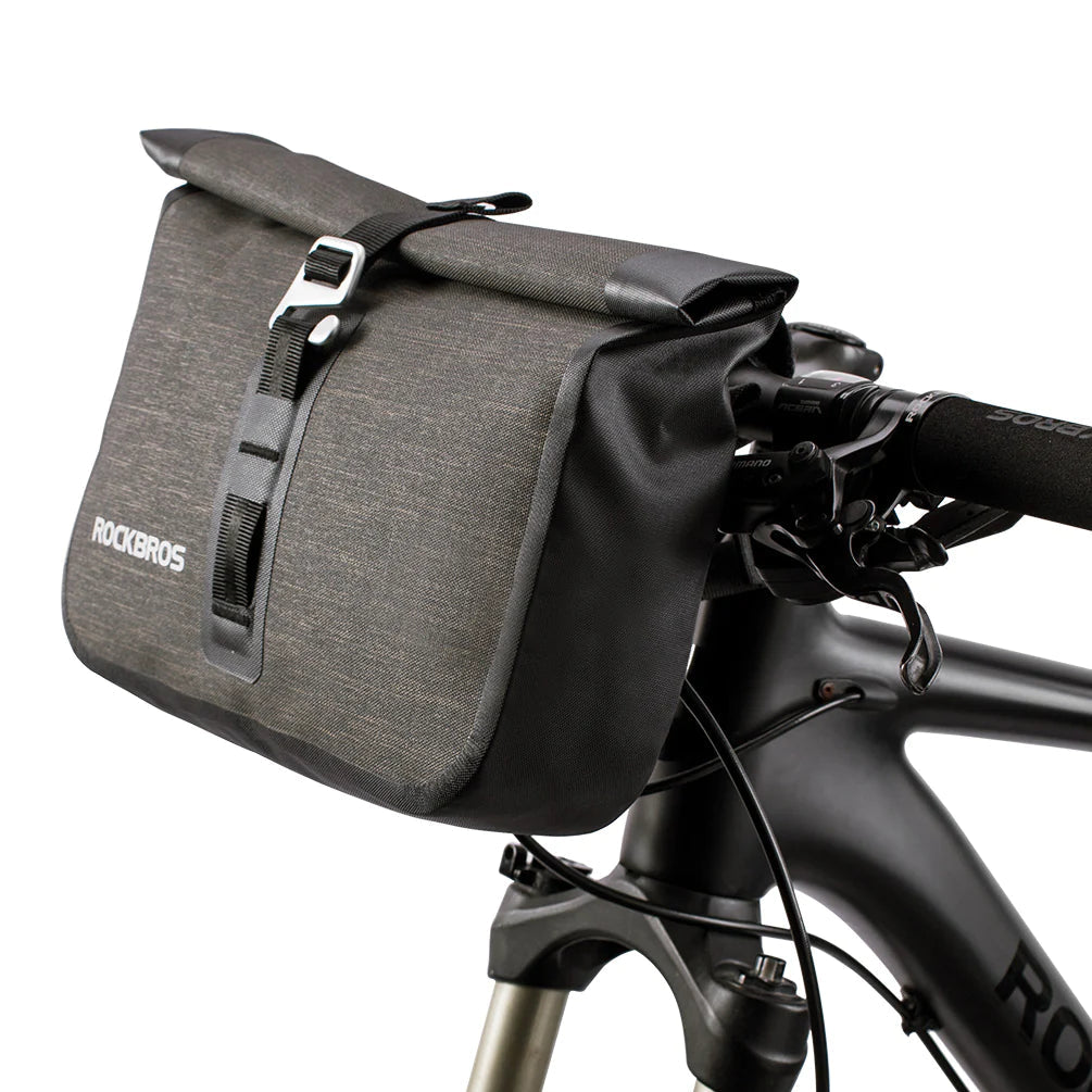 RockBros Bike Roll Bag, a waterproof handlebar pannier designed for cycling, featuring adjustable straps and a reflective logo for safety.