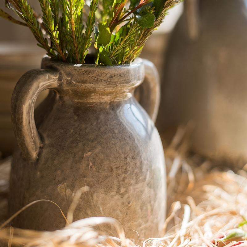 Binglie Glazed Pottery Vase with Handles, showcasing a unique handmade ceramic design in tan, gray, and brown colors.