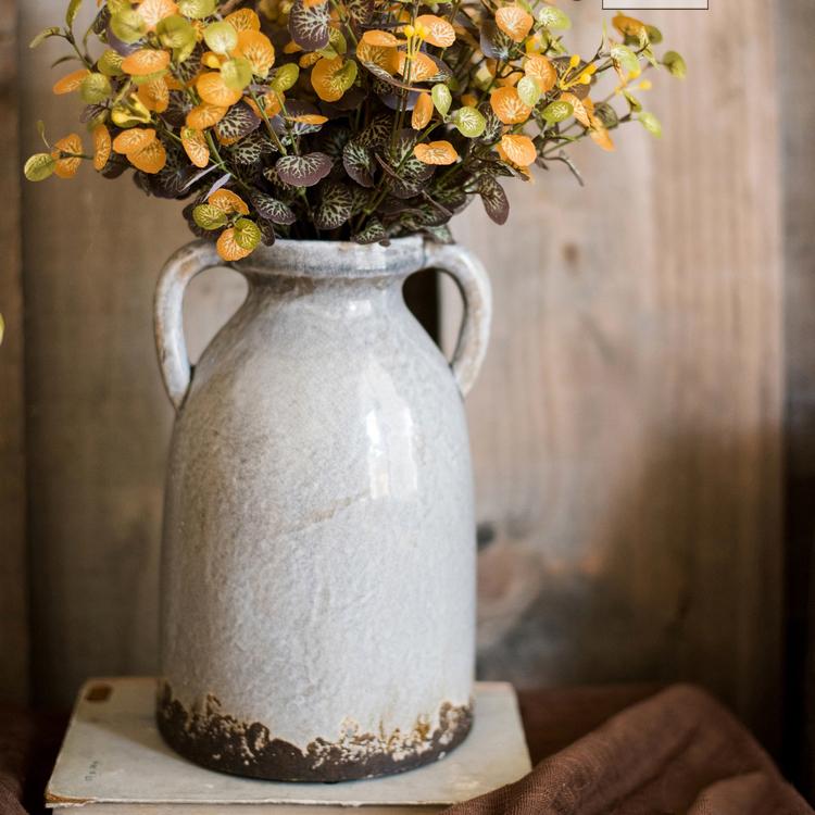 Binglie Glazed Pottery Vase with Handles, showcasing a unique handmade ceramic design in tan, gray, and brown colors.