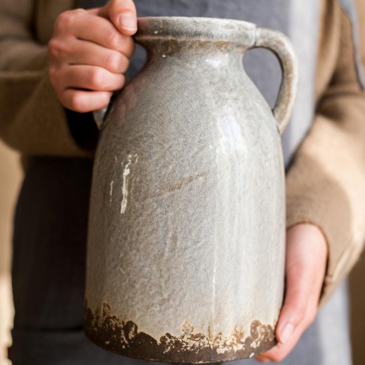 Binglie Glazed Pottery Vase with Handles, showcasing a unique handmade ceramic design in tan, gray, and brown colors.