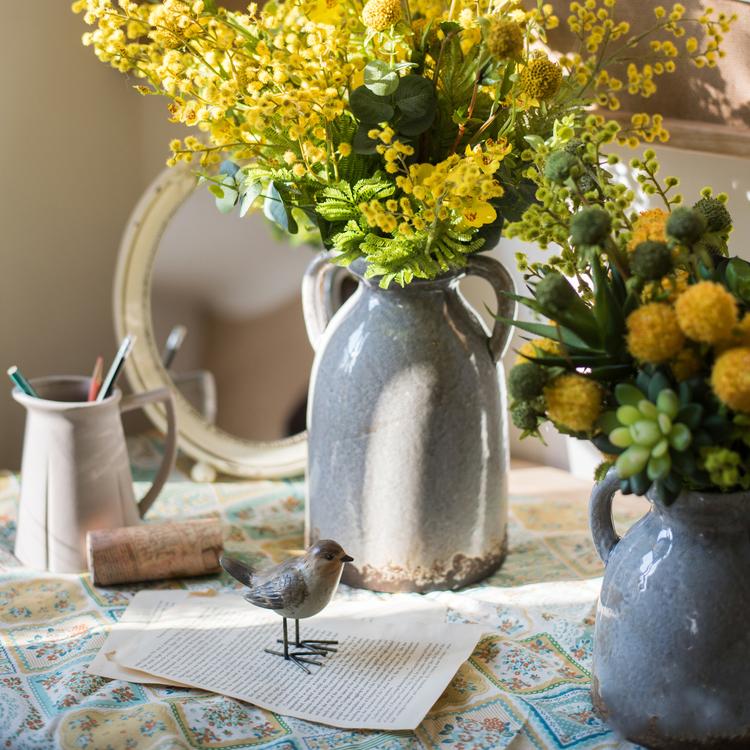 Binglie Glazed Pottery Vase with Handles, showcasing a unique handmade ceramic design in tan, gray, and brown colors.