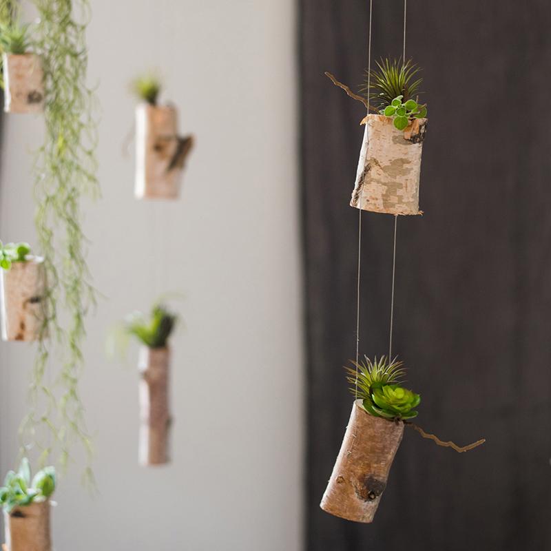 Birch wood tiny planter string hanging planter decoration with three planters in natural khaki color, showcasing a stylish indoor plant display.