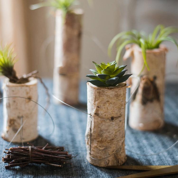 Birch wood tiny planter string hanging planter decoration with three planters in natural khaki color, showcasing a stylish indoor plant display.