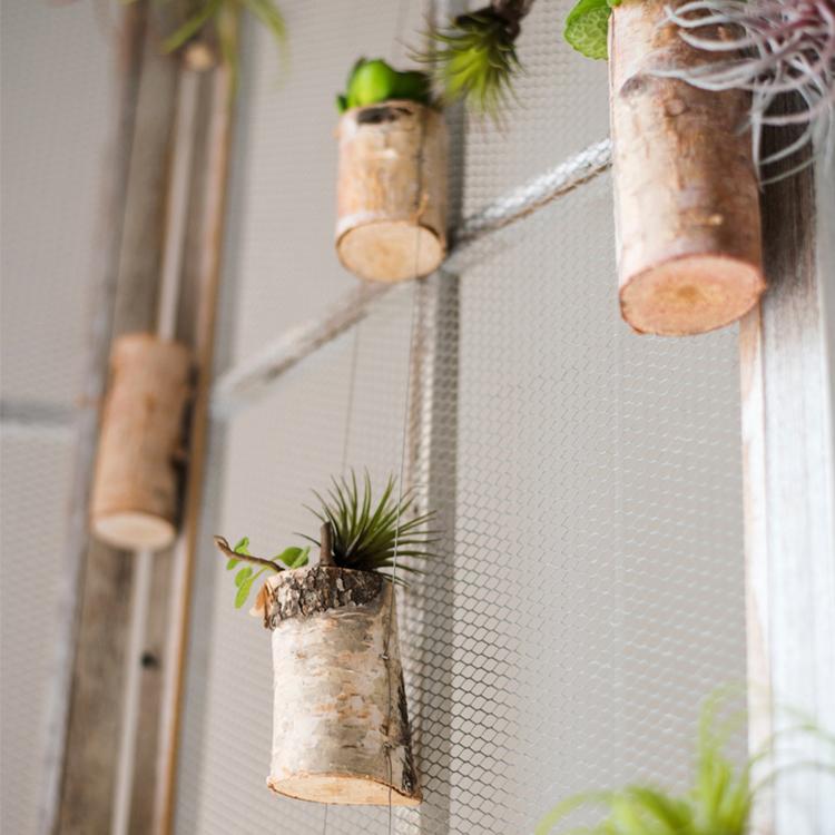 Birch wood tiny planter string hanging planter decoration with three planters in natural khaki color, showcasing a stylish indoor plant display.