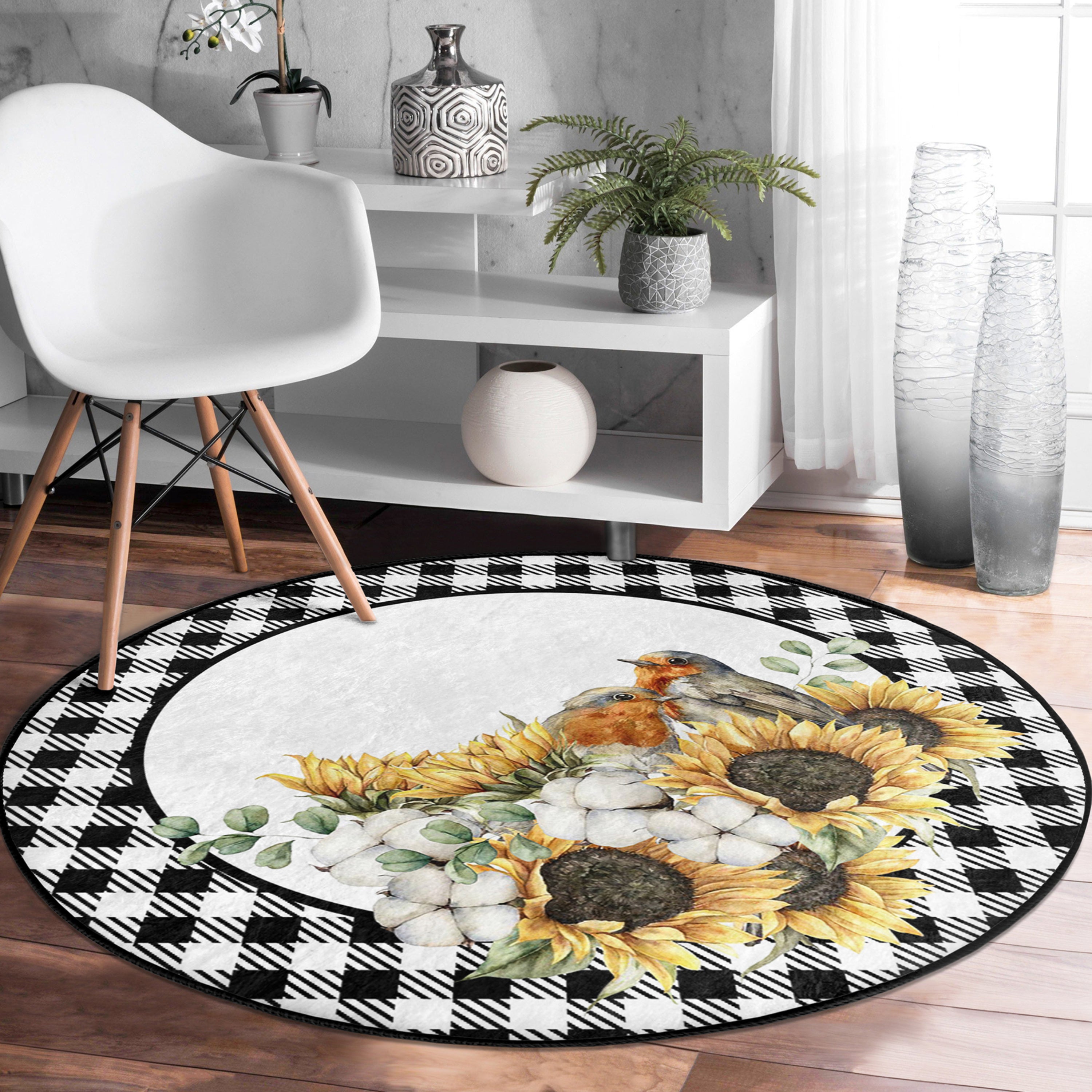 A round rug featuring vibrant sunflowers and birds, perfect for fall home decor, showcasing a beautiful autumn design.