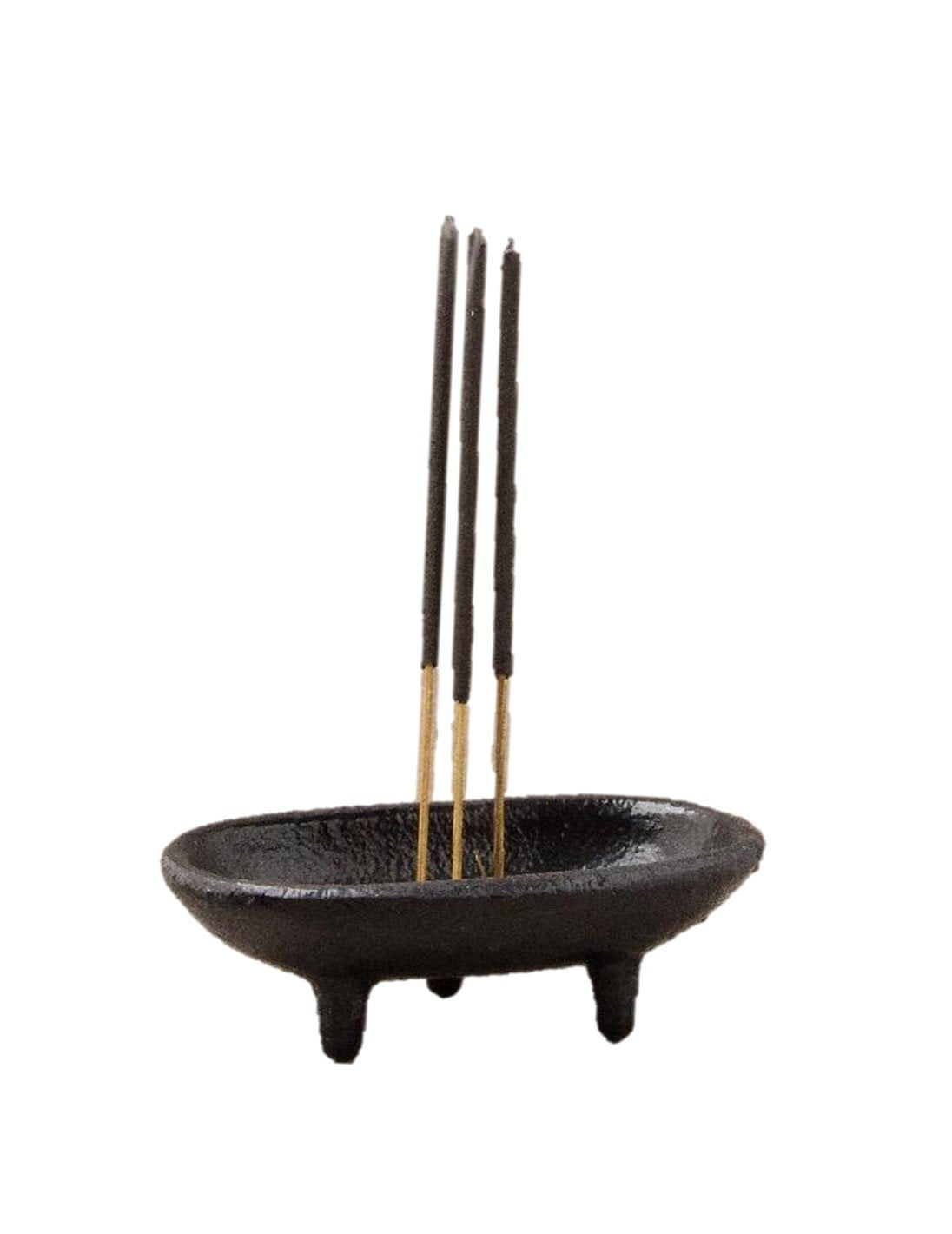 Black cast iron canoe-shaped incense smudge pot with removable holder for incense sticks and cones.