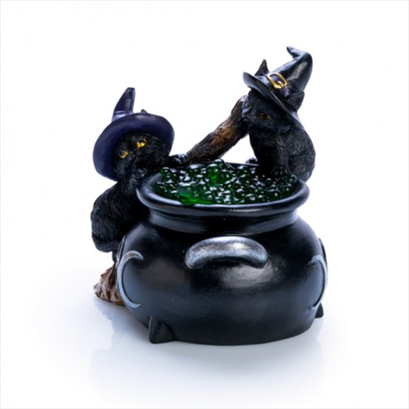 A whimsical black cat sitting atop a cauldron, glowing softly with LED light, perfect for Halloween decor.