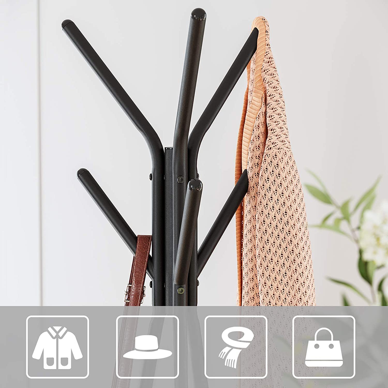 Black coat rack stand with industrial design featuring two triangular vintage shelves for added storage, perfect for minimalist home decor.