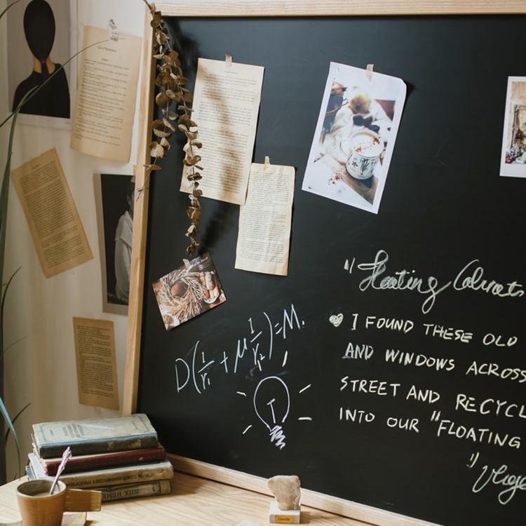 Black Magnetic Chalk Board with Solid Wood Frame, showcasing its sleek design and various sizes.