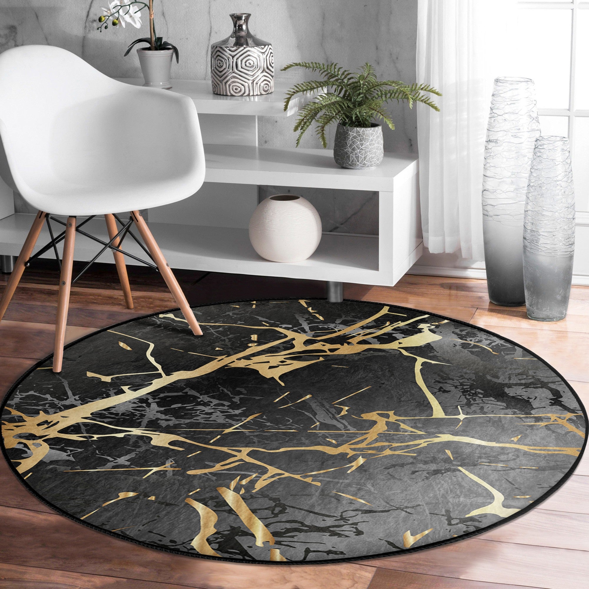 A luxurious round rug featuring a black marble design, made from soft velvet fabric, showcasing elegance and sophistication in home decor.