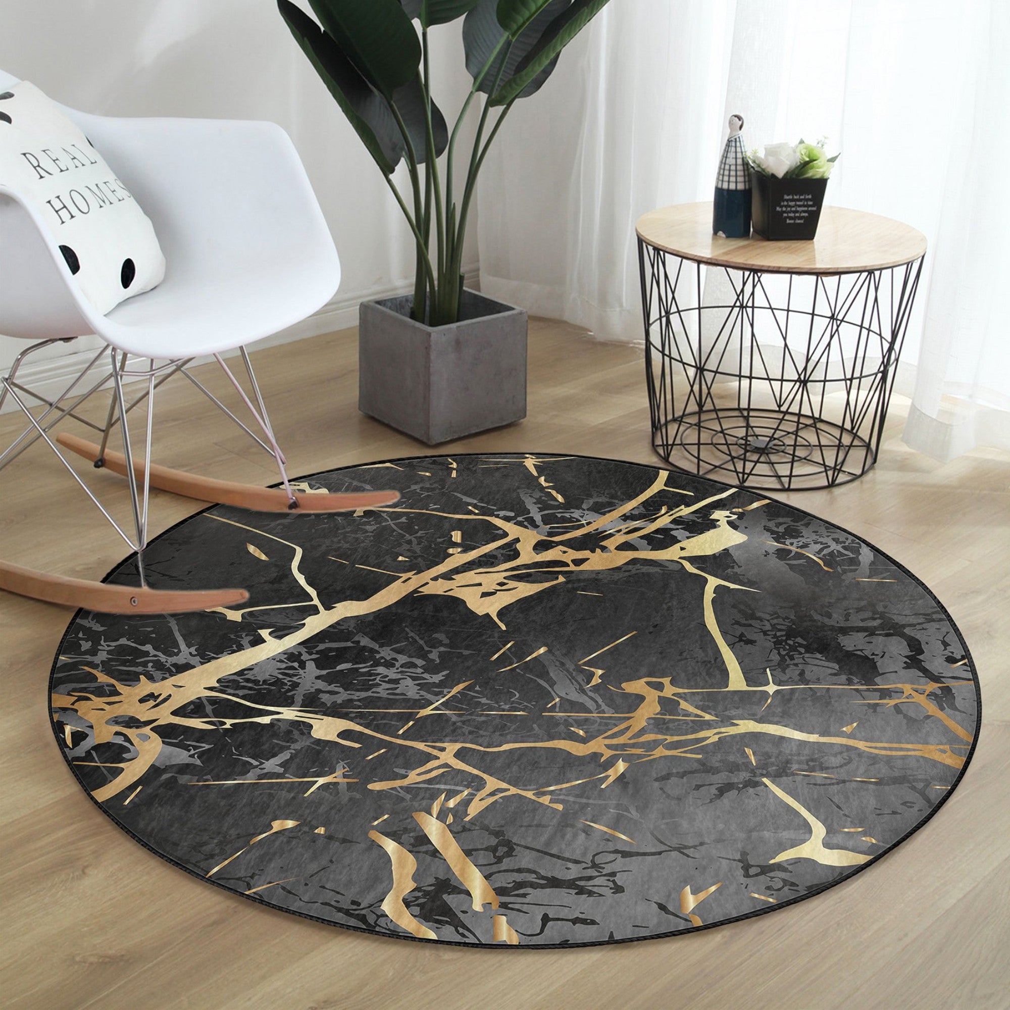 A luxurious round rug featuring a black marble design, made from soft velvet fabric, showcasing elegance and sophistication in home decor.