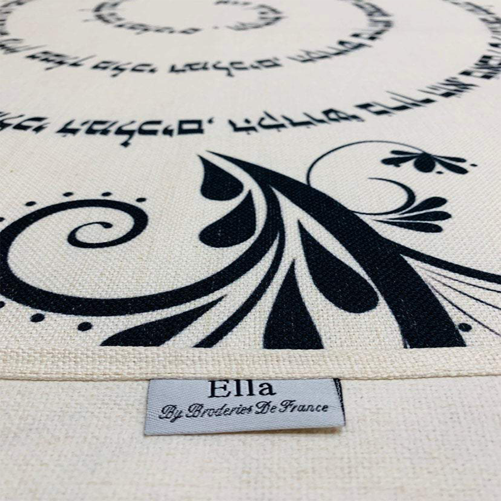 Luxurious Black Shalom Aleichem tablecloth featuring intricate swirls and floral designs, perfect for Shabbat dinners.