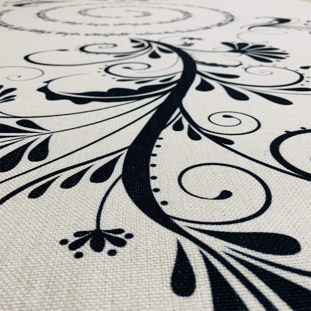 Luxurious Black Shalom Aleichem tablecloth featuring intricate swirls and floral designs, perfect for Shabbat dinners.