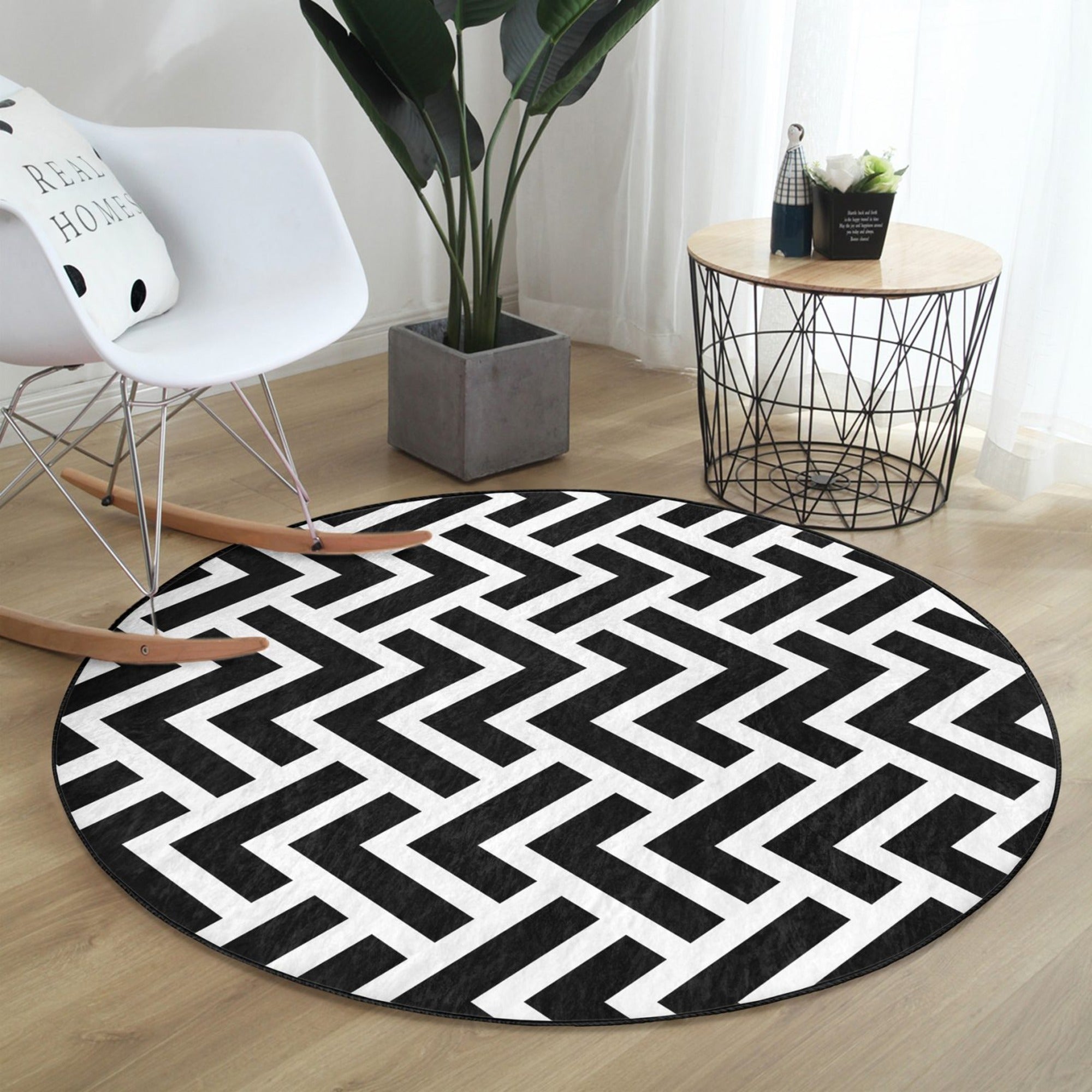 Black-White Decorative Round Rug, featuring a stylish design and soft velvet fabric, perfect for living room décor.