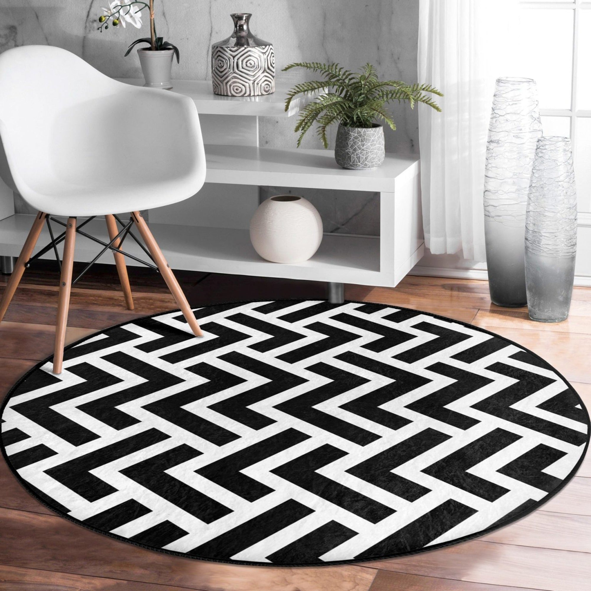 Black-White Decorative Round Rug, featuring a stylish design and soft velvet fabric, perfect for living room décor.