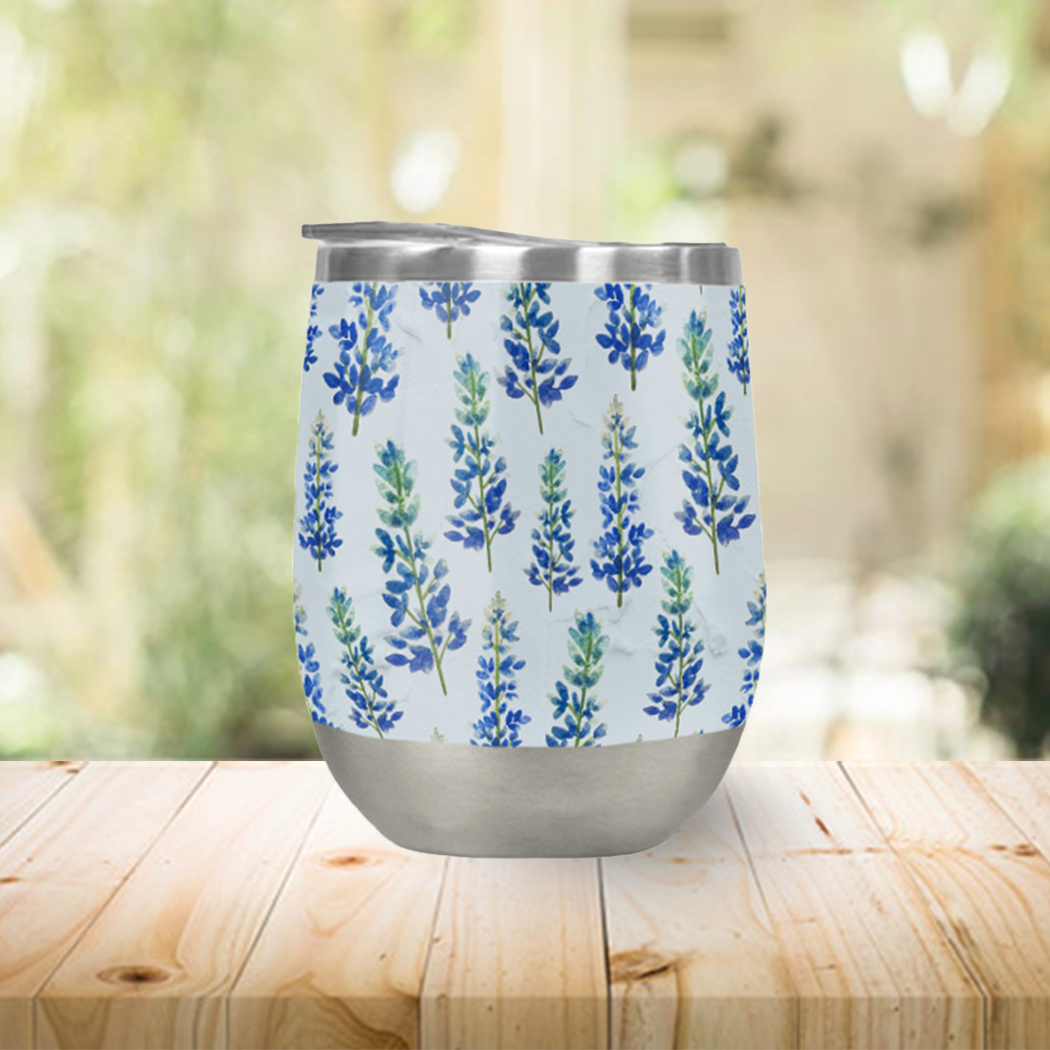 Blue Bonnet Wine Tumbler made of stainless steel with a plastic lid, designed for outdoor use.