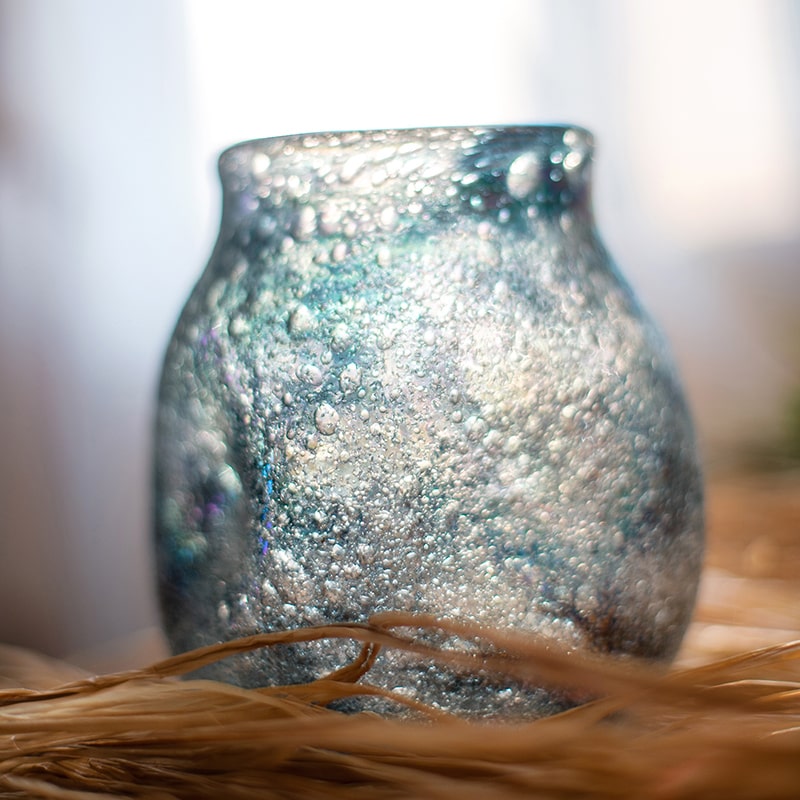 A beautifully handcrafted Blue Bubble Hand Blown Glass Vase showcasing unique bubble patterns and vibrant blue colors.