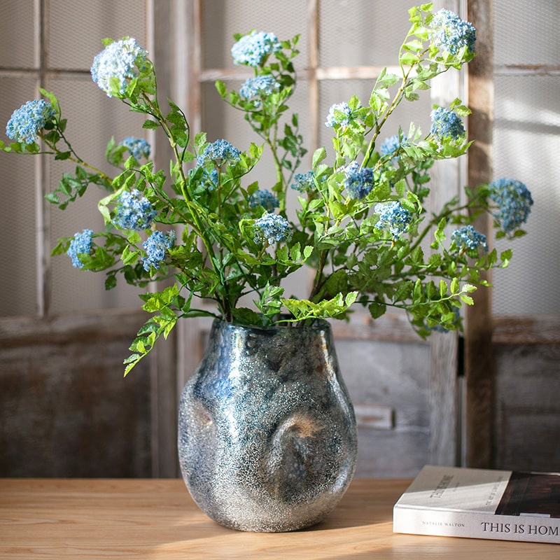 A beautifully handcrafted Blue Bubble Hand Blown Glass Vase showcasing unique bubble patterns and vibrant blue colors.