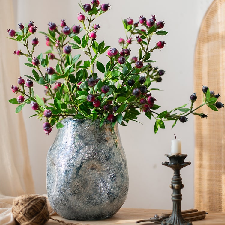 A beautifully handcrafted Blue Bubble Hand Blown Glass Vase showcasing unique bubble patterns and vibrant blue colors.