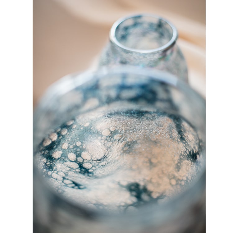 A beautifully handcrafted Blue Bubble Hand Blown Glass Vase showcasing unique bubble patterns and vibrant blue colors.