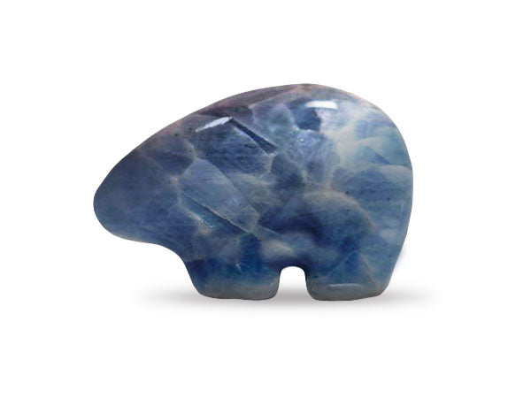 A hand-carved Blue Calcite Fetish Bear, showcasing its unique pale to medium deep blue color and Zuni style design, perfect for naturalists.