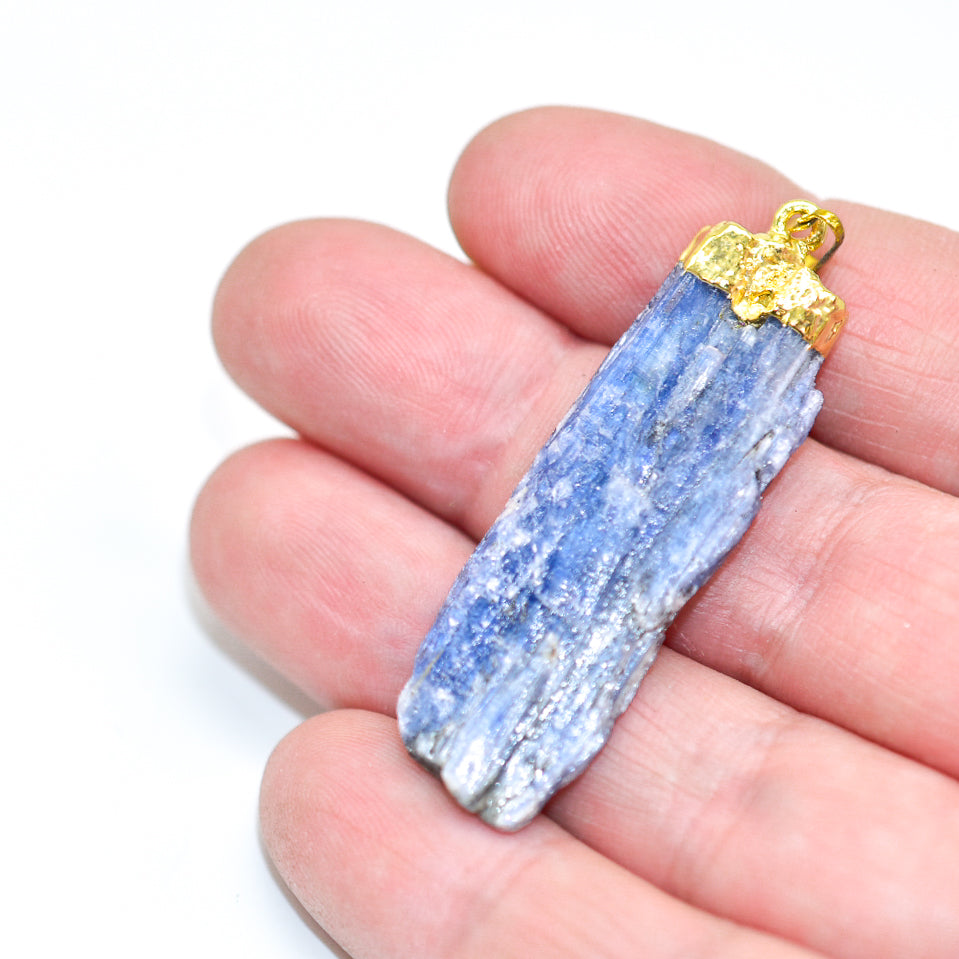 A beautiful Blue Kyanite Pendant showcasing its vibrant blue color and natural stone texture, perfect for chakra healing.