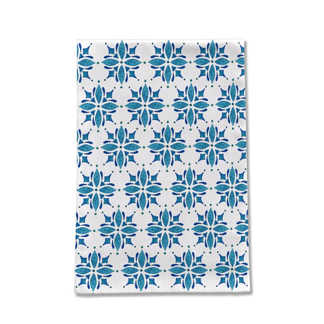 A blue tile patterned tea towel made of cotton twill, measuring 18x30 inches, showcasing a cozy kitchen decor style.