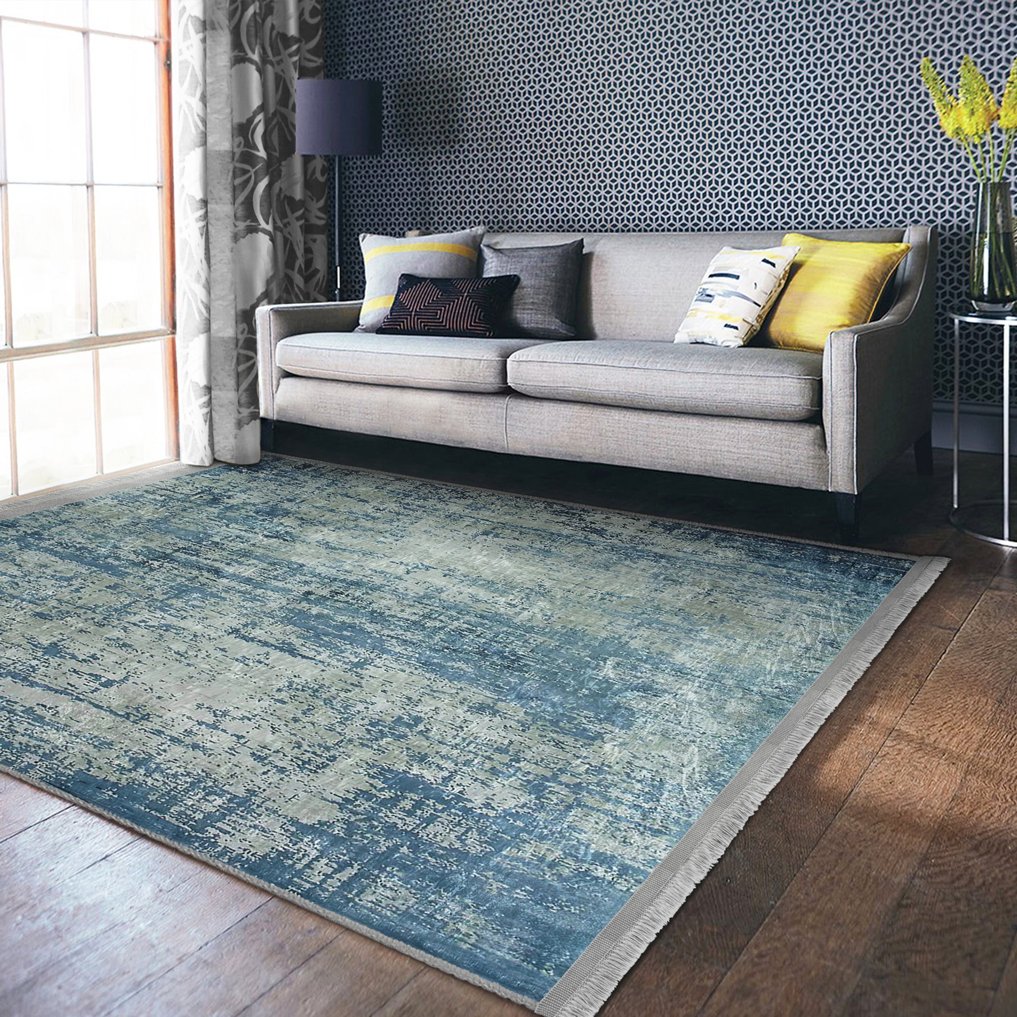 Blue Washable Area Rug by Homeezone featuring a stylish blue pattern and fringes, perfect for any room.