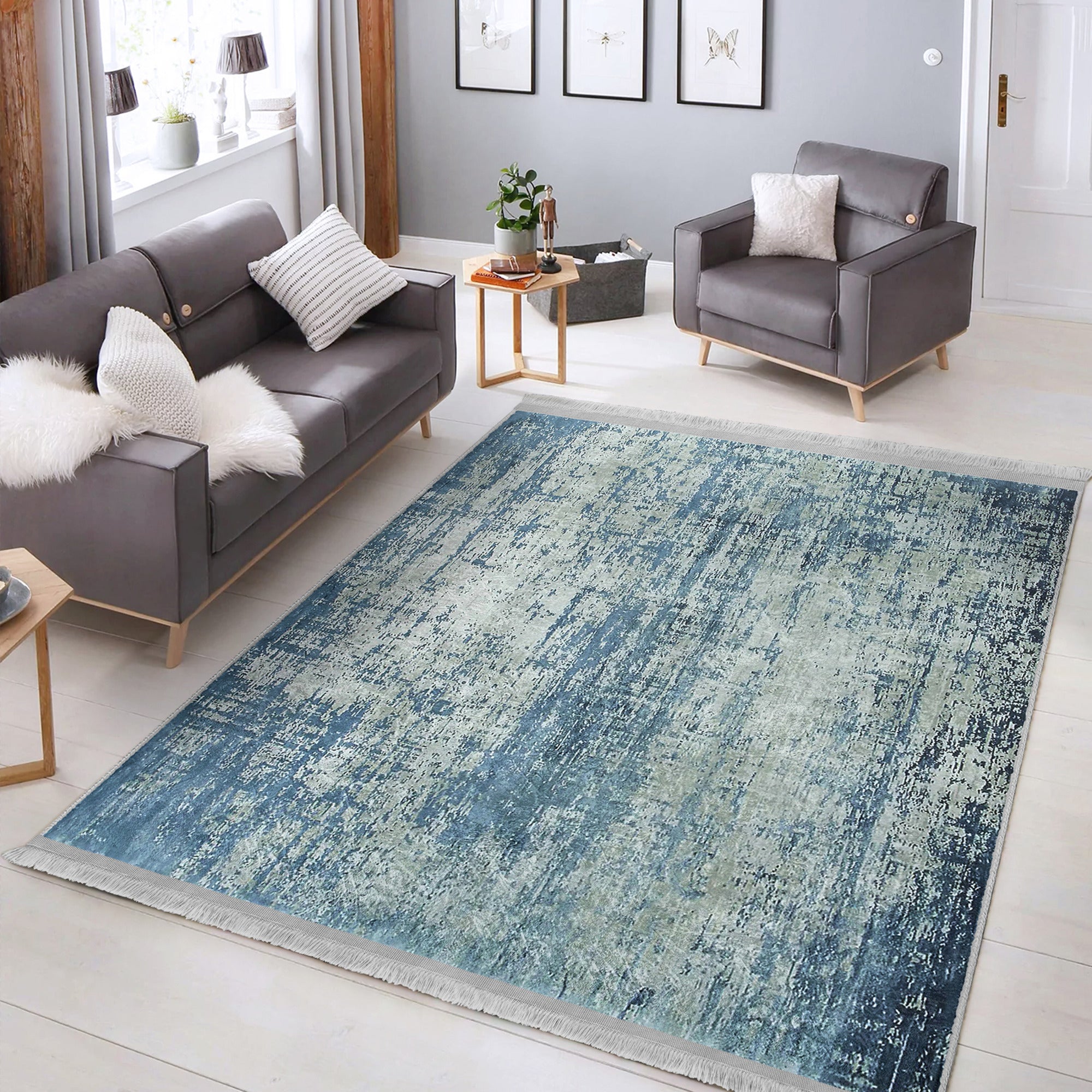 Blue Washable Area Rug by Homeezone featuring a stylish blue pattern and fringes, perfect for any room.