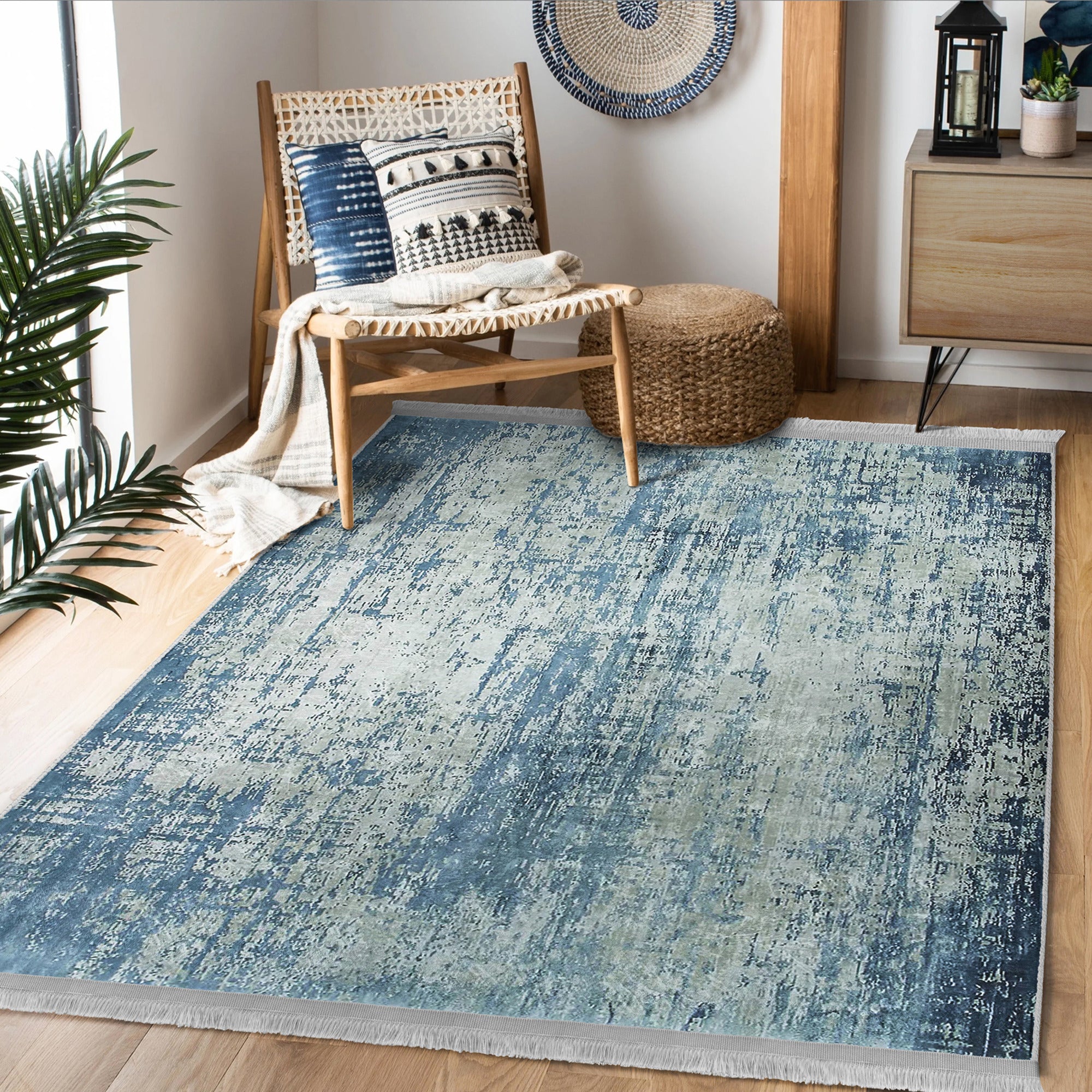 Blue Washable Area Rug by Homeezone featuring a stylish blue pattern and fringes, perfect for any room.