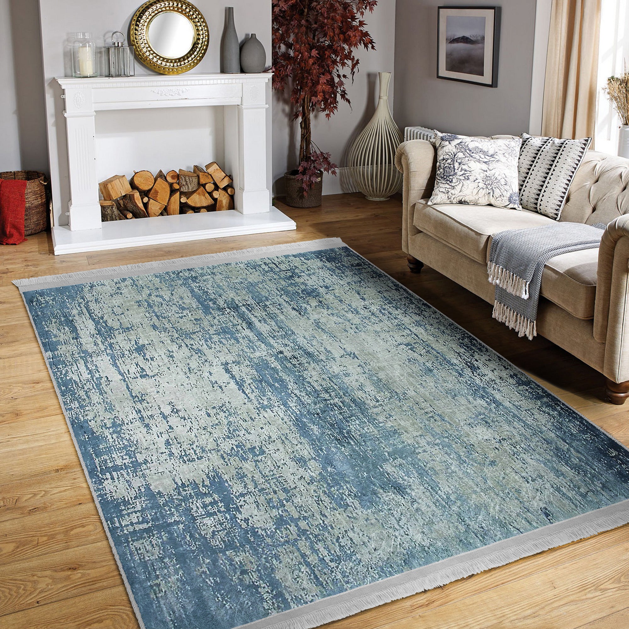 Blue Washable Area Rug by Homeezone featuring a stylish blue pattern and fringes, perfect for any room.